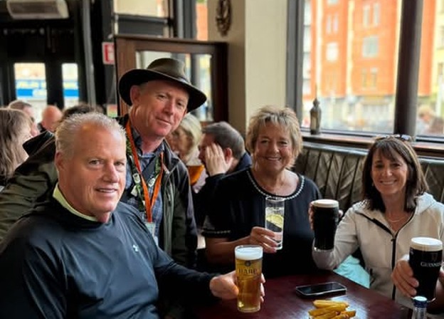 A LetzGo guide in Dublin with the group in a city pub